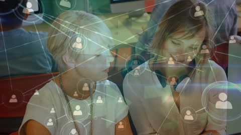 Collaborative Women in Modern Office Networking