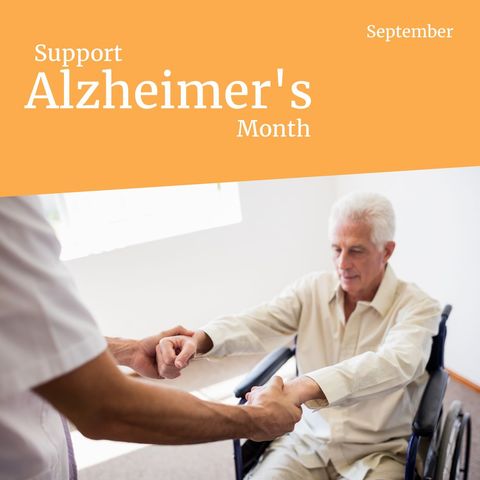 Doctor assisting elderly man in wheelchair for alzheimer's awareness
