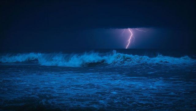 Dramatic Night Ocean Scene with Lightning and Waves
