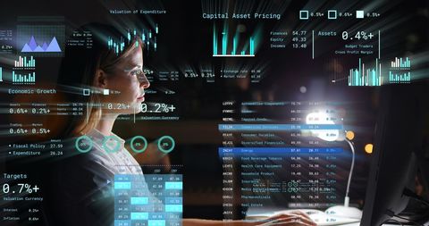 Businesswoman Analyzing Financial Data on Holographic Display - Download Free Stock Images Pikwizard.com