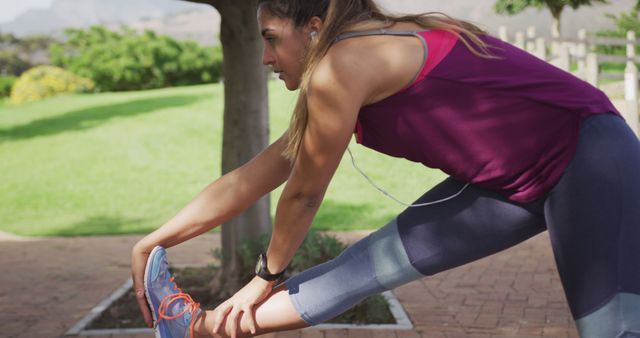 Fit Young Woman Stretching Before Outdoor Workout in Park - Download Free Stock Images Pikwizard.com