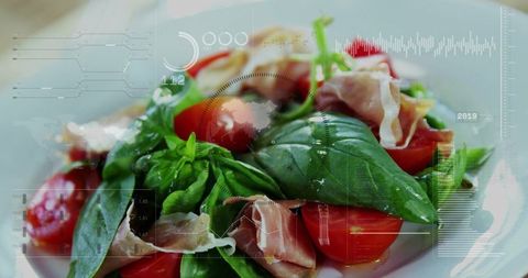Vibrant basil and prosciutto salad with cherry tomatoes and futuristic hud overlay