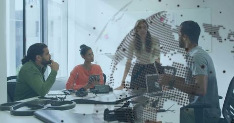 Collaborating on drone prototype in modern office meeting room