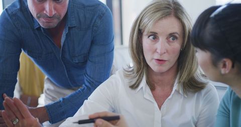 Collaborative Team Discussion in Modern Workspace