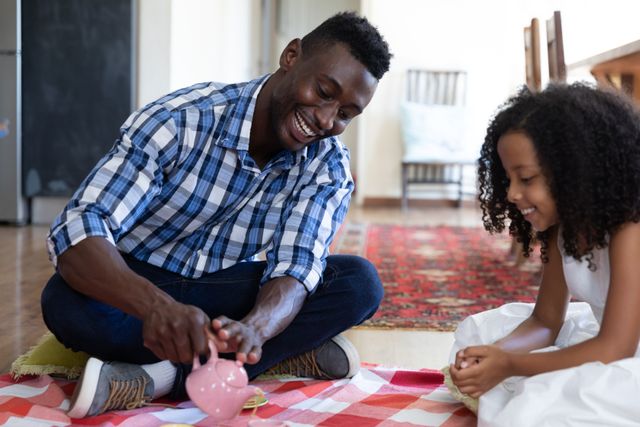 Father and Daughter Enjoying a Fun Tea Party at Home - Download Free Stock Images Pikwizard.com