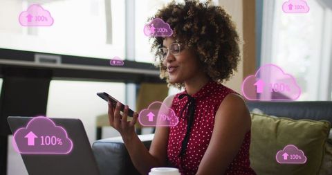 Businesswoman connecting on phone with digital cloud interface