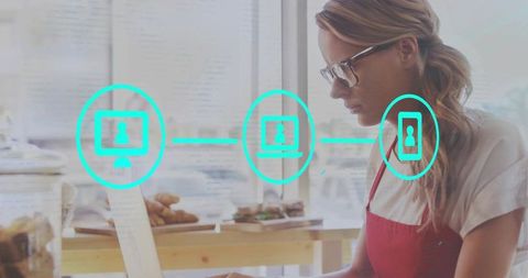 Barista in Cafe Embracing Technology with Digital Connectivity