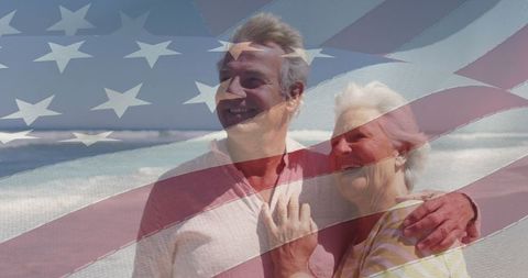 Senior Couple Embracing by Beach with American Flag Overlay