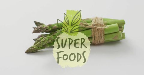 Fresh asparagus bundle with super foods label