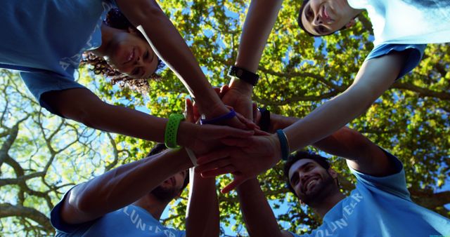 Group of Diverse Volunteers Stacking Hands Outdoors - Download Free Stock Images Pikwizard.com