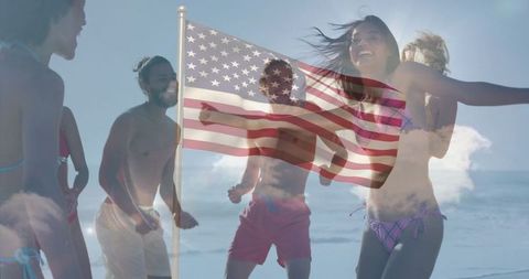 Youthful beach celebration with american flag symbolizing unity
