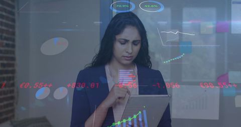 Businesswoman Analyzing Financial Data with Tablet in Modern Office
