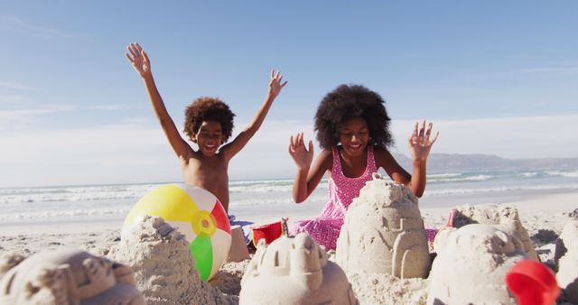 Excited Children Building Sandcastles on Sunny Beach - Download Free Stock Images Pikwizard.com