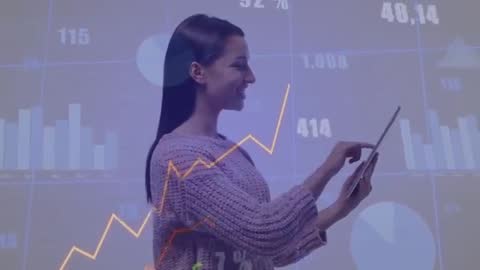 Female Analyst Interacting with Digital Financial Graphs