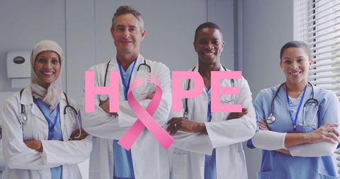 Diverse medical team supporting breast cancer awareness