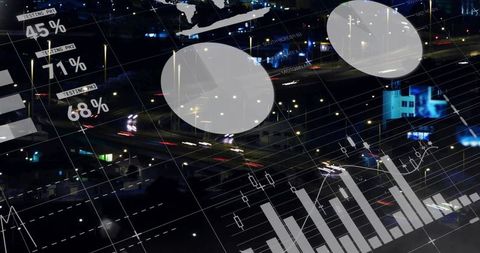 Overlaying real-time urban traffic analytics on nocturnal cityscape with charts and grids