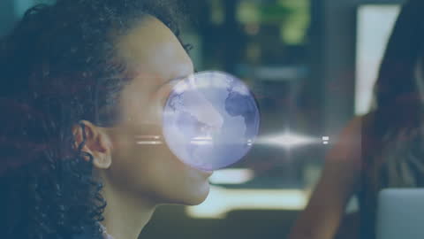 Digital Globe Overlay on Businesswoman Profile in Office