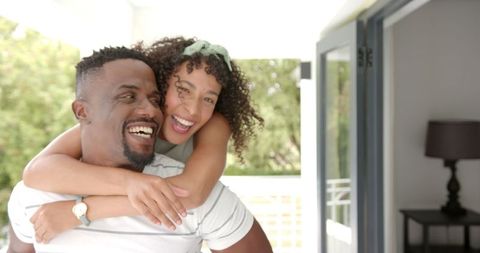 Playful Couple Embracing Joy and Togetherness Outdoors - Download Free Stock Images Pikwizard.com