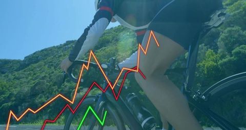 Cyclist With Performance Graph Cycling Mountain Road in Sun