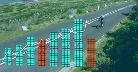 Cyclist Rides Coastal Road with Data Analytics Overlay