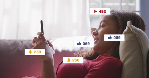 Social Media Engagement Icons Over Woman Browsing Smartphone