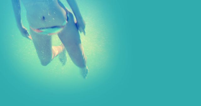 Person Swimming Underwater in Clear Blue Sea - Download Free Stock Images Pikwizard.com