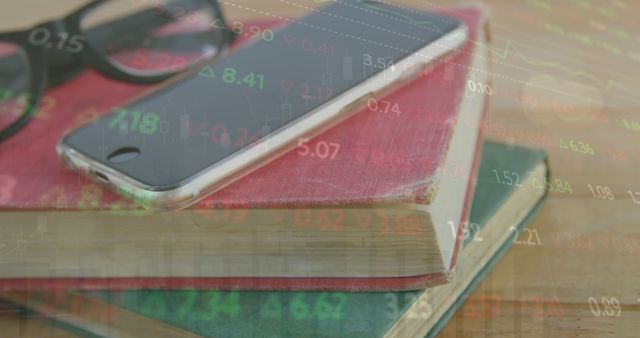 Image of stock market data processing over close up of books, smartphone and glasses. Global economy and business technology concept