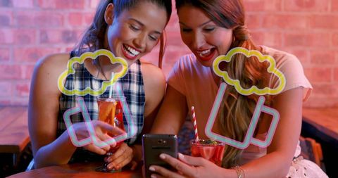 Happy Friends Enjoying Drinks and Social Media