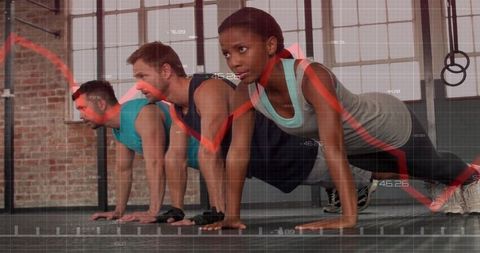 Fitness Enthusiasts Training Together in Urban Gym with Performance Graph Overlay