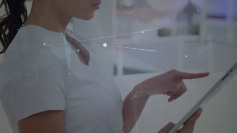 Digital Networking with Biracial Woman Using Tablet