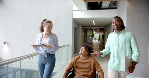 Inclusive Team Collaboration in Modern Office Hallway