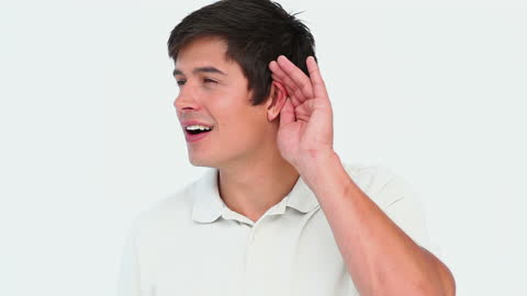 Man Cupping Ear Listening Intently