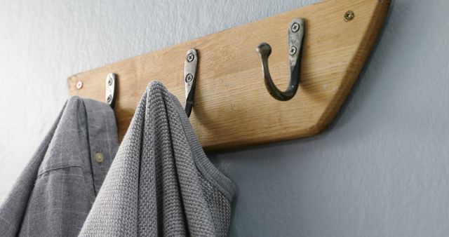 Wooden Coat Rack with Clothes Hanging on Wall - Download Free Stock Images Pikwizard.com