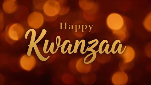 Happy kwanzaa gold calligraphy typography on warm amber bokeh with metallic shine