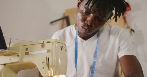 Focused African American Tailor Working on Sewing Project - Download Free Stock Images Pikwizard.com