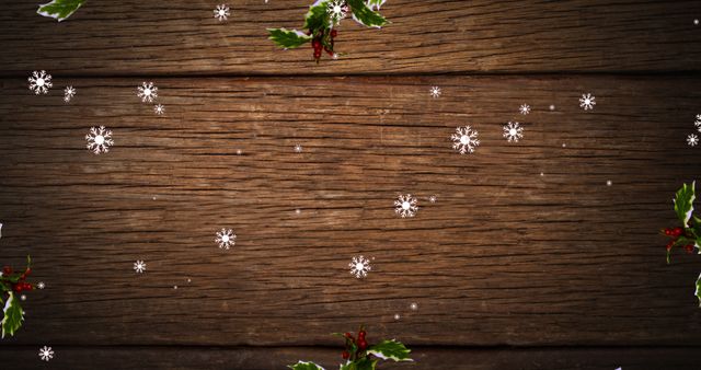 Snowflakes Falling Over Holly Leaves and Wooden Background - Download Free Stock Images Pikwizard.com