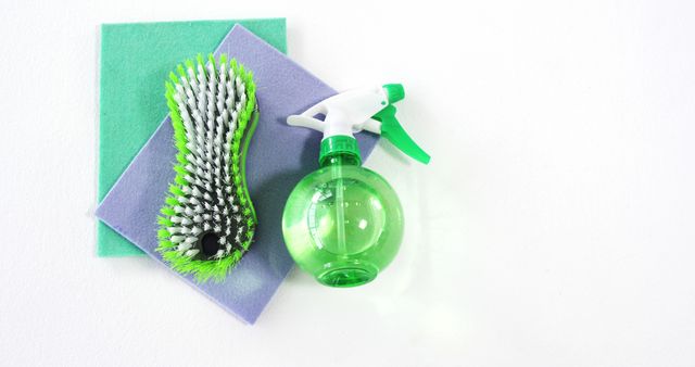 Cleaning Supplies on White Background with Spray Bottle and Brush - Download Free Stock Images Pikwizard.com