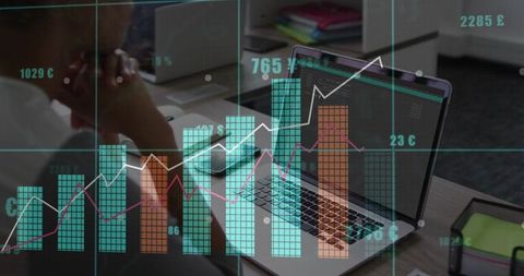 Team Collaborating and Analyzing Financial Data on Laptop with Overlaid Charts and Graphs