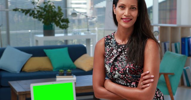 Confident Professional Woman in Office Environment Smiling at Camera - Download Free Stock Images Pikwizard.com