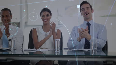 Diverse Business Team Applauding in Modern Office