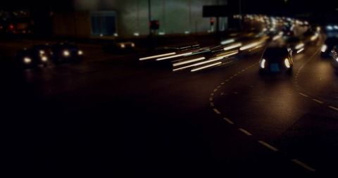 Dynamic Night Traffic with Light Trails on Urban Roadway