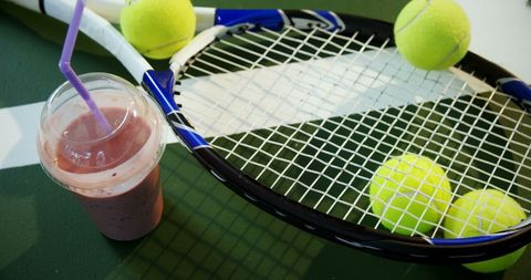 Refreshing Smoothie with Tennis Equipment on Court - Download Free Stock Images Pikwizard.com