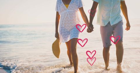 Romantic Couple Holding Hands on Summer Beach Walk