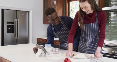 Happy Couple Cooking Together in Modern Kitchen Using Tablet - Download Free Stock Images Pikwizard.com