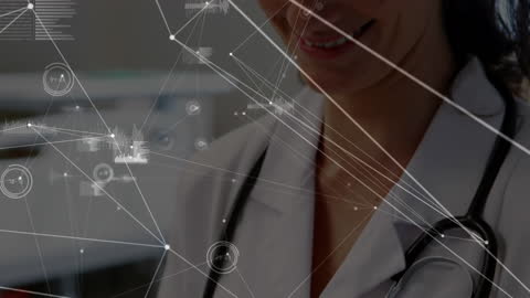 Female Doctor Engaging with Digital Network in Hospital Setting