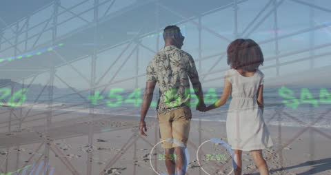 Concept of Relaxation and Finance, Couple Walking Beachfront Borrows