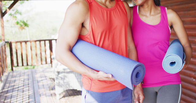 Couple Holding Yoga Mats Preparing for Outdoor Exercise - Download Free Stock Images Pikwizard.com