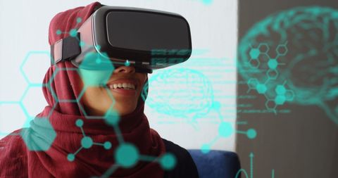 Young Asian Woman Exploring Virtual Reality with Scientific Data Visualization