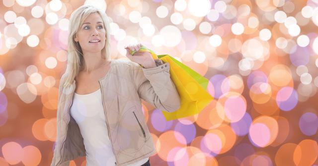 Woman with shopping bags looking away  over bokeh - Download Free Stock Photos Pikwizard.com
