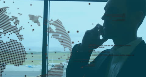 Businessman Analyzing Digital Data on Smartphone by Cityscape